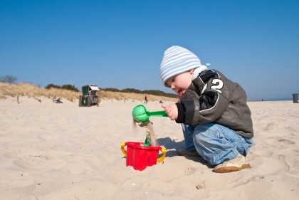 ImageBuddeln am Sandstrand