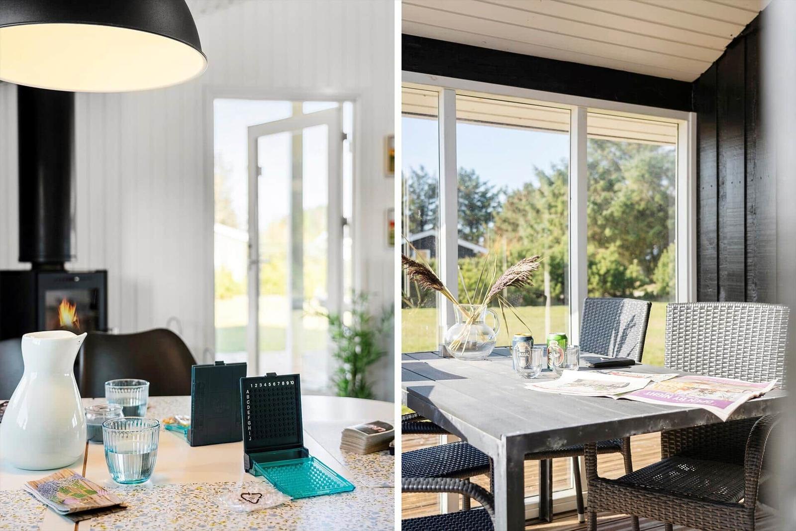 Indoor space with fireplace and table. Outdoor area with table and chairs. View of green landscape.