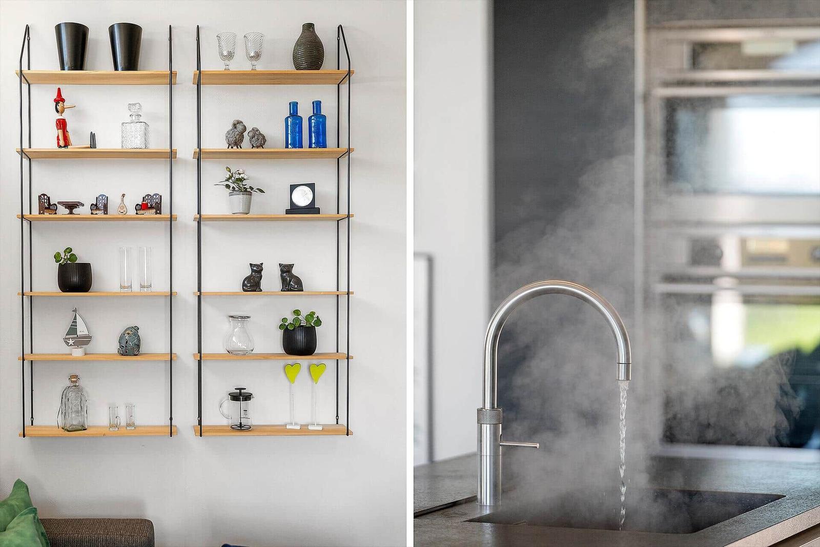 Wohnzimmer mit Regalen und moderne Küche mit Wasserhahn