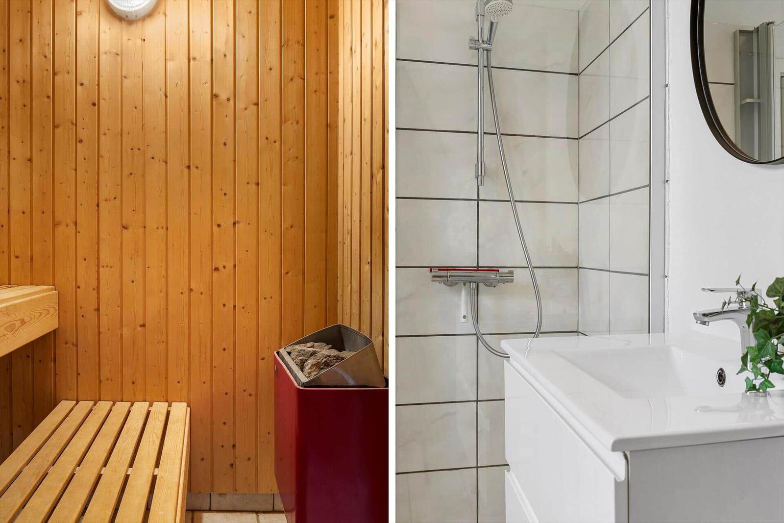 Sauna mit Holzwand und Sitzbank. Duschbereich mit Dusche und Waschbecken.