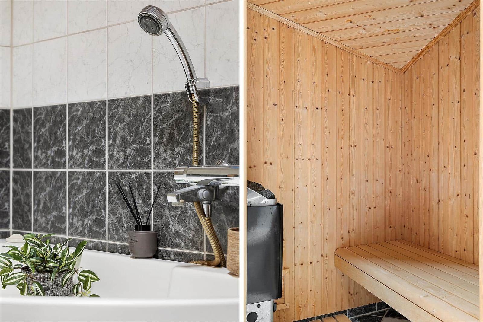 Bad mit Dusche und Sauna mit Holzbank.
