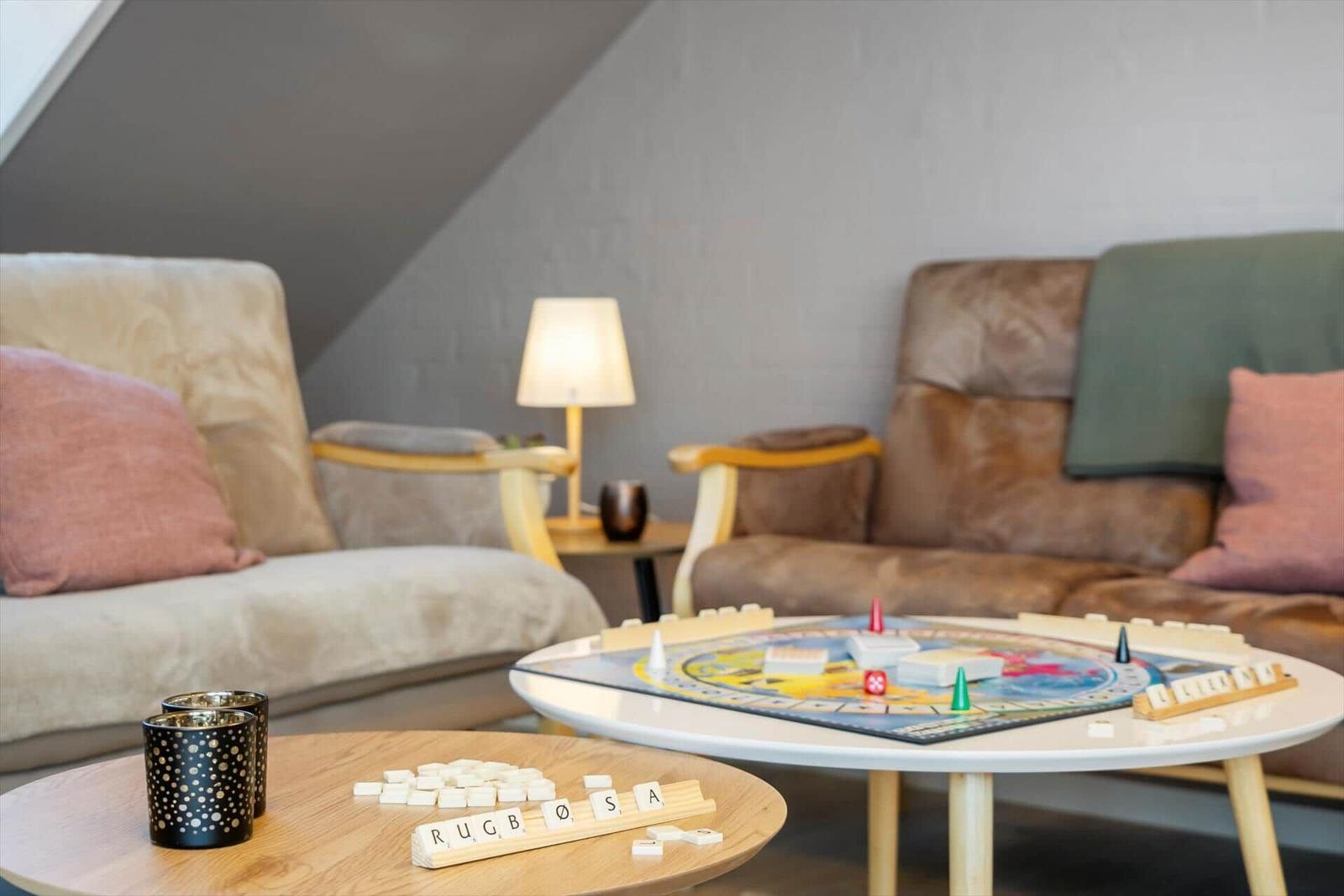 Living room with sofa, table, and toys