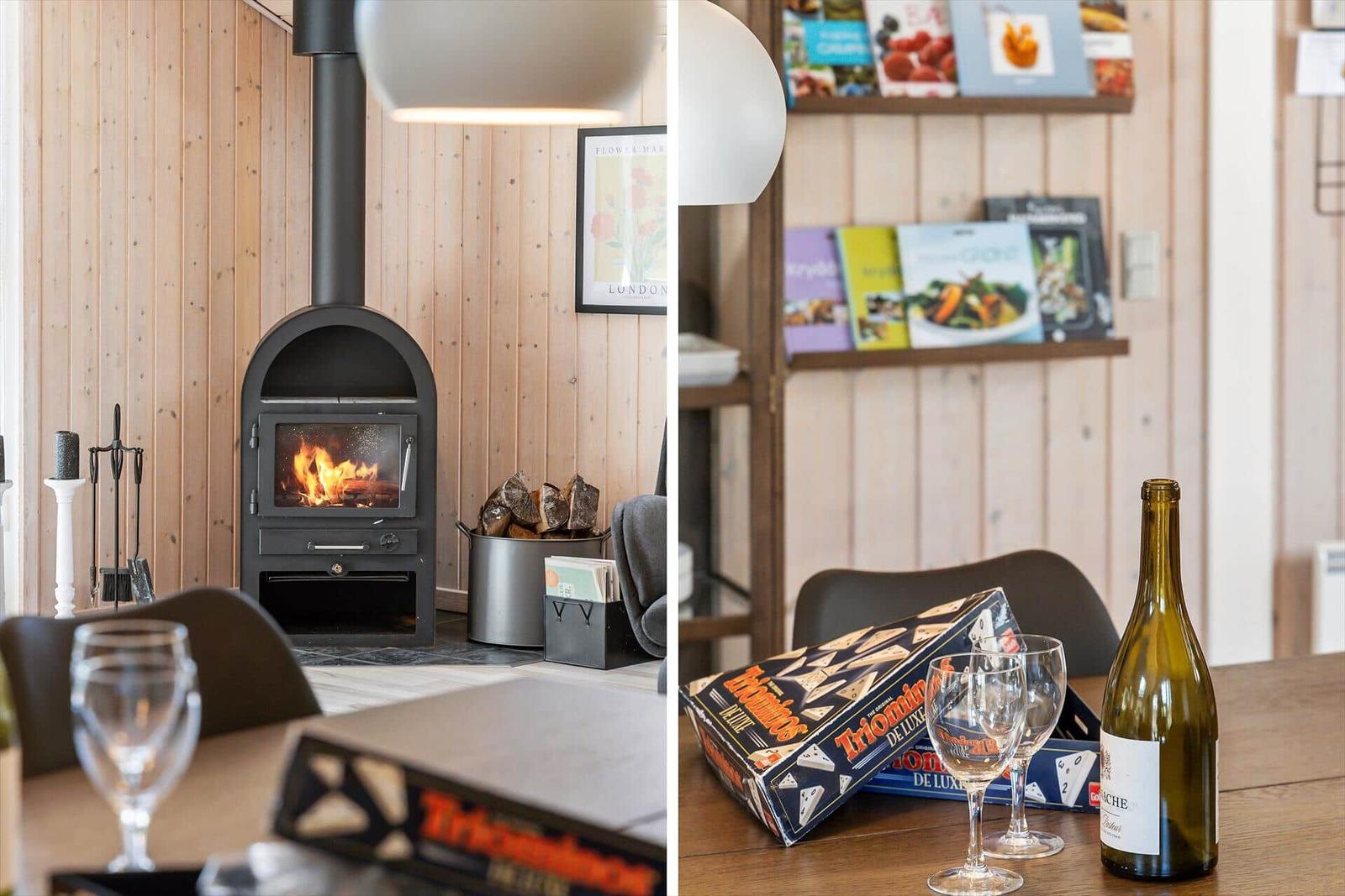 Kamin mit Holzofen, Tisch mit Wein und Spielzeug