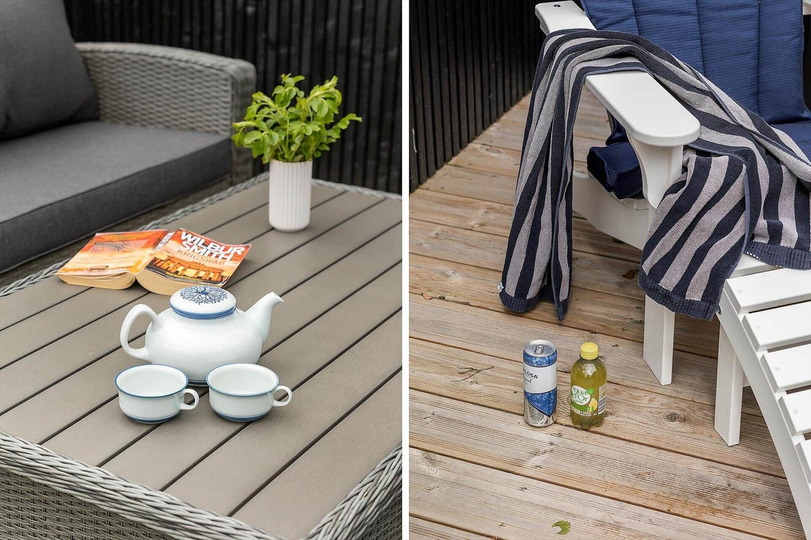Terrasse mit Tisch, Stühlen, Tee-Set und Getränken