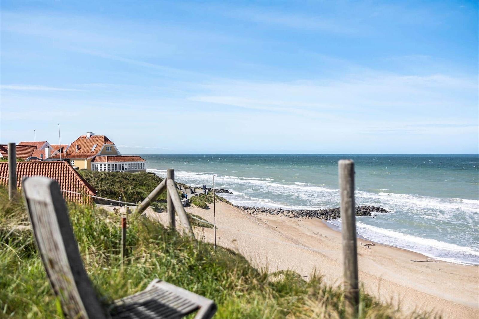 Strandhaus mit Blick aufs Meer und Dünen