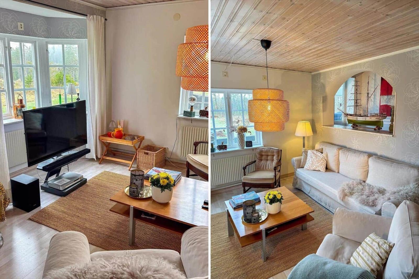 Wohnzimmer mit Sofa, Couchtisch und Fernseher. Holzdecke und Fenster mit Blick ins Freie.