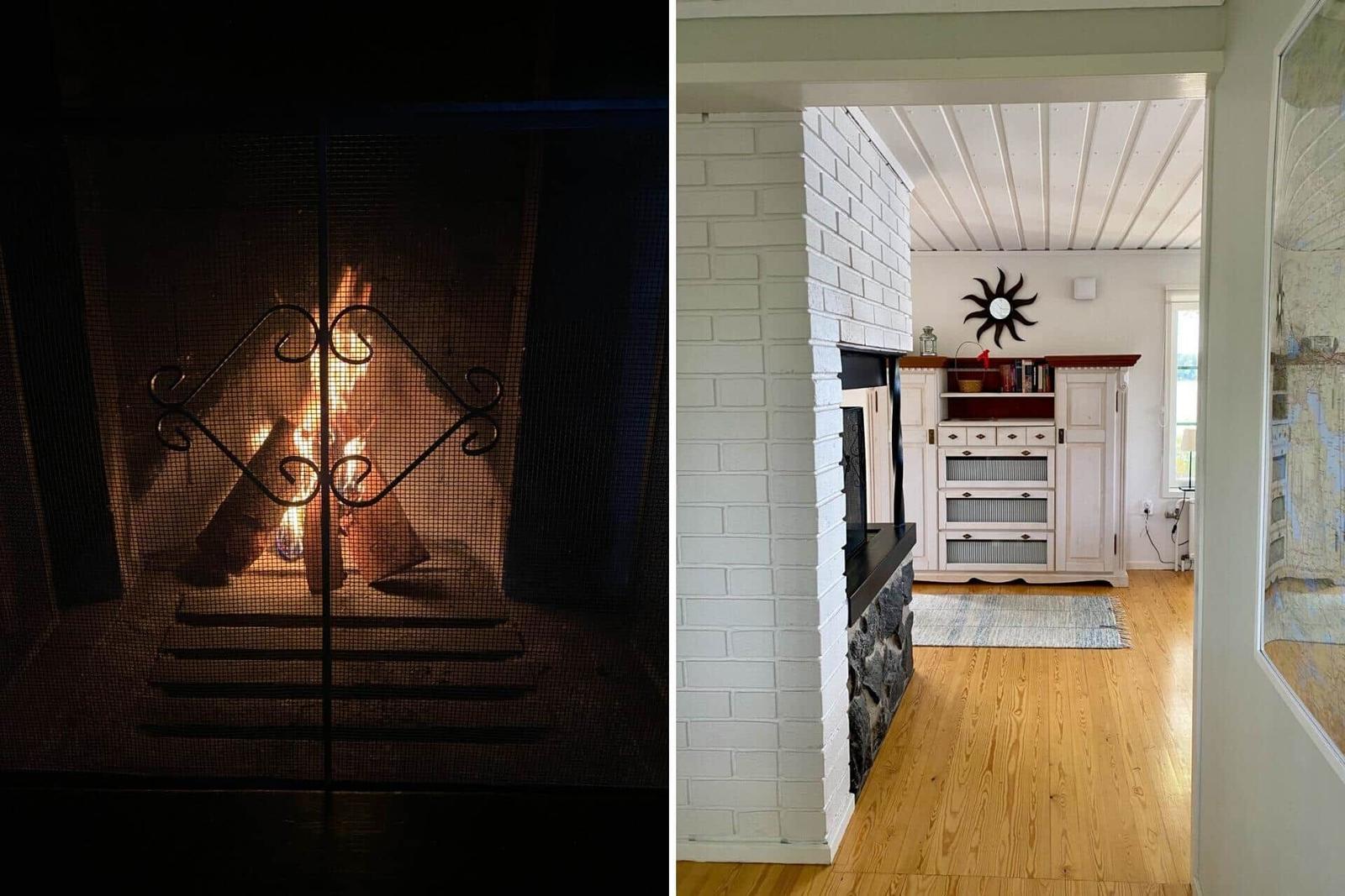 Kamin mit brennendem Feuer und weißer Kachelwand im Wohnbereich.