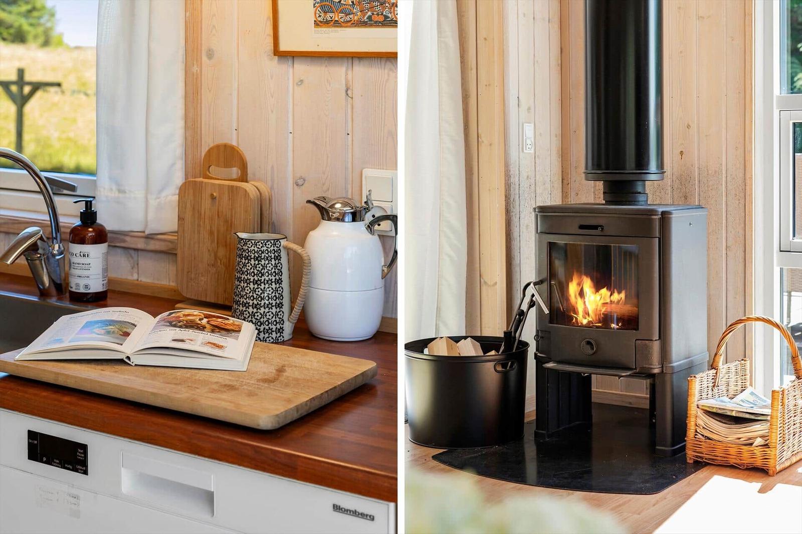 Kitchen with wooden countertop and open cookbook. In living area, wood stove burns with firewood.