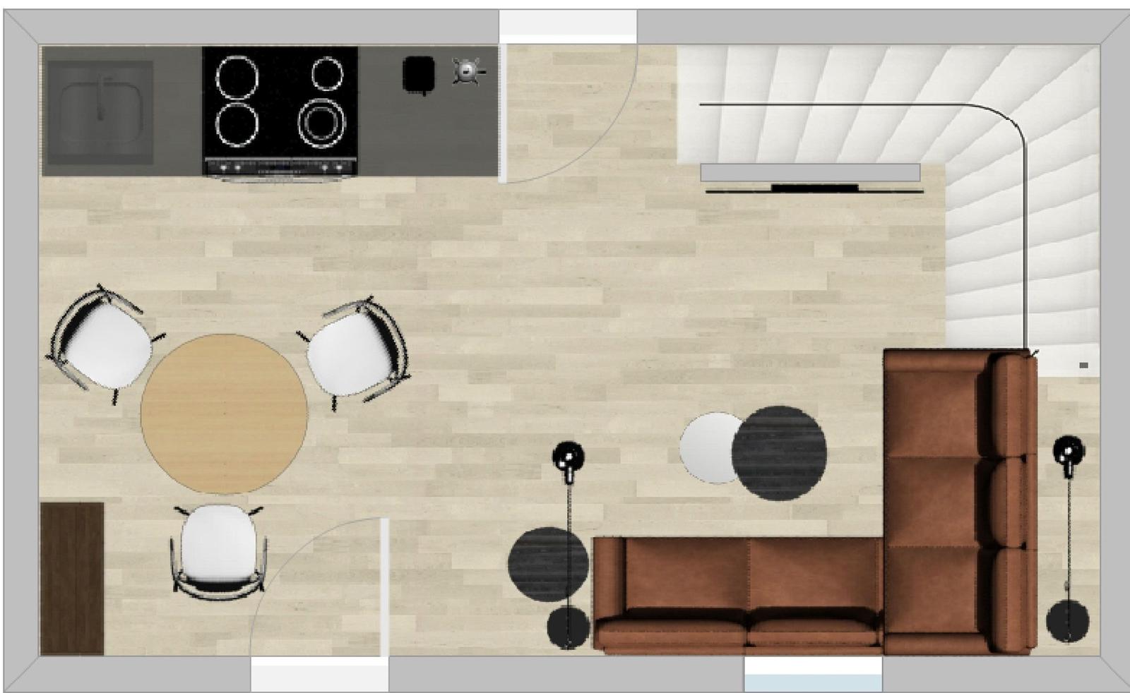 Küche mit Essbereich und Wohnzimmer mit Sofa und TV.