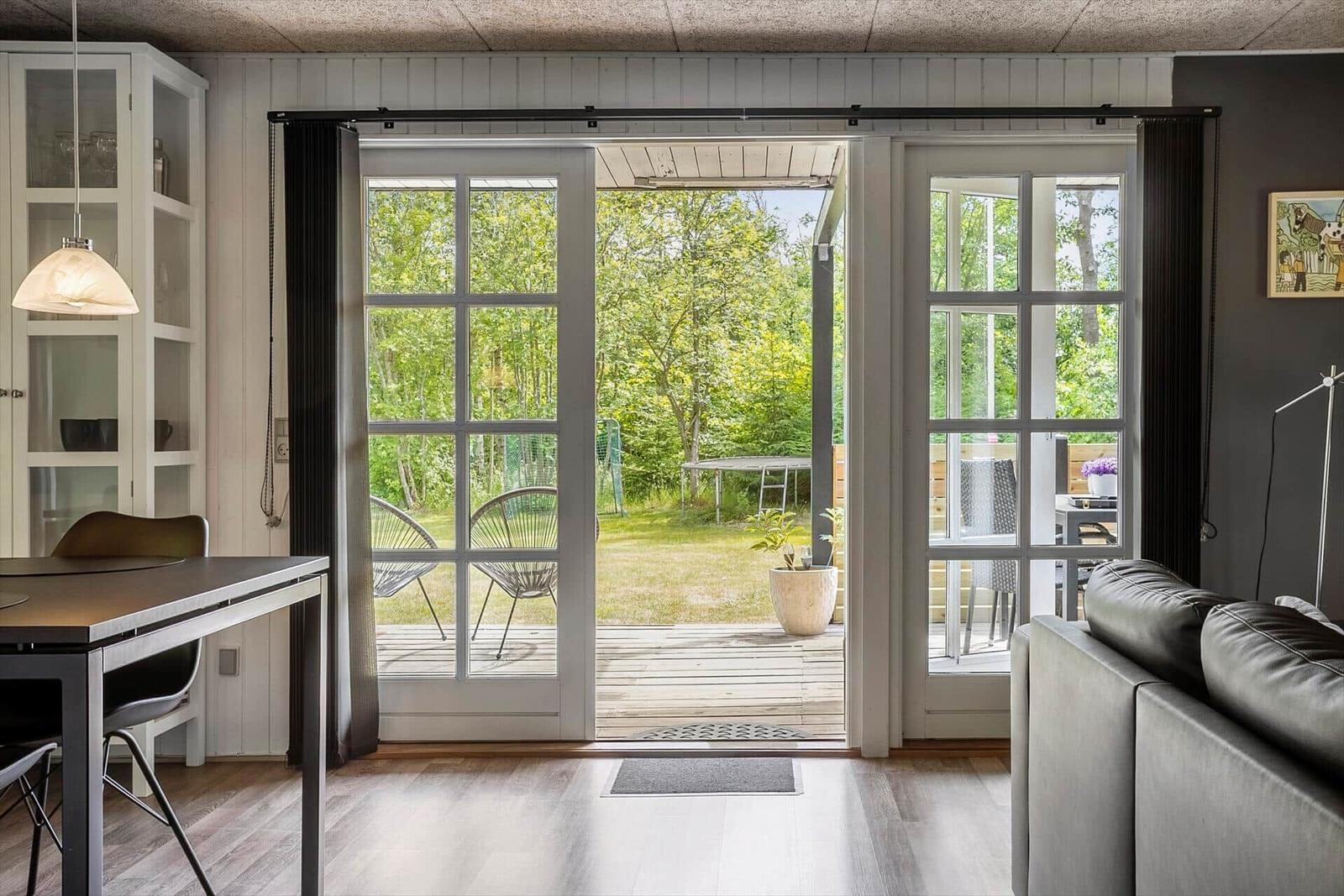 Entrance area with glass doors to terrace and garden.