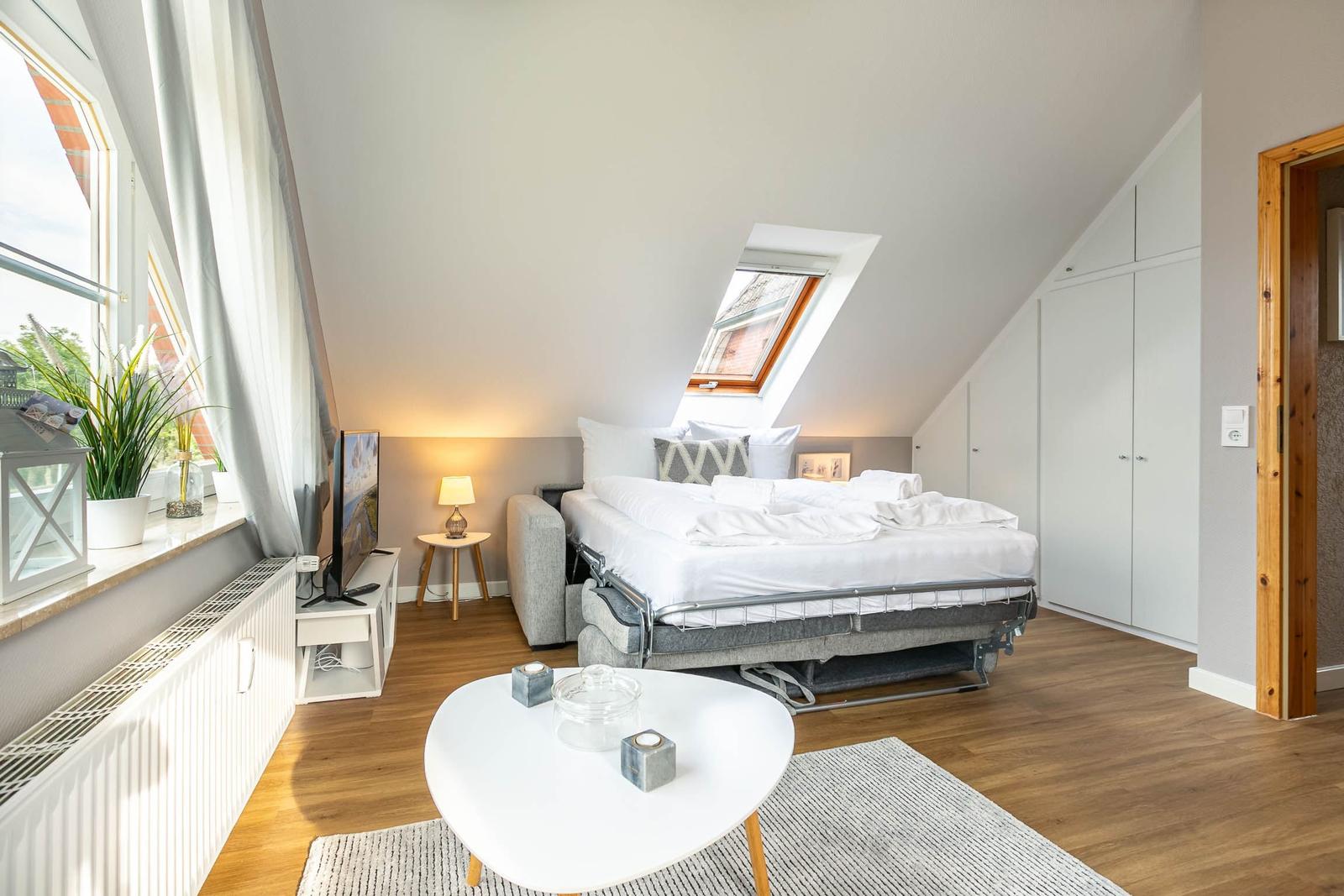 Wohnzimmer mit Schlafsofa...