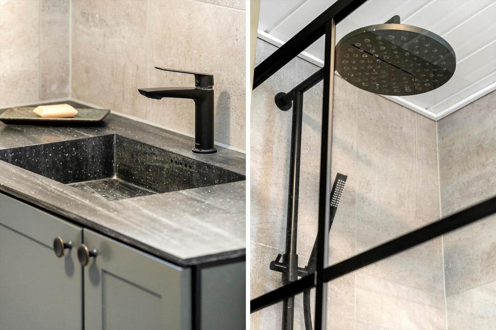 Bathroom with modern sink and shower with rain showerhead.