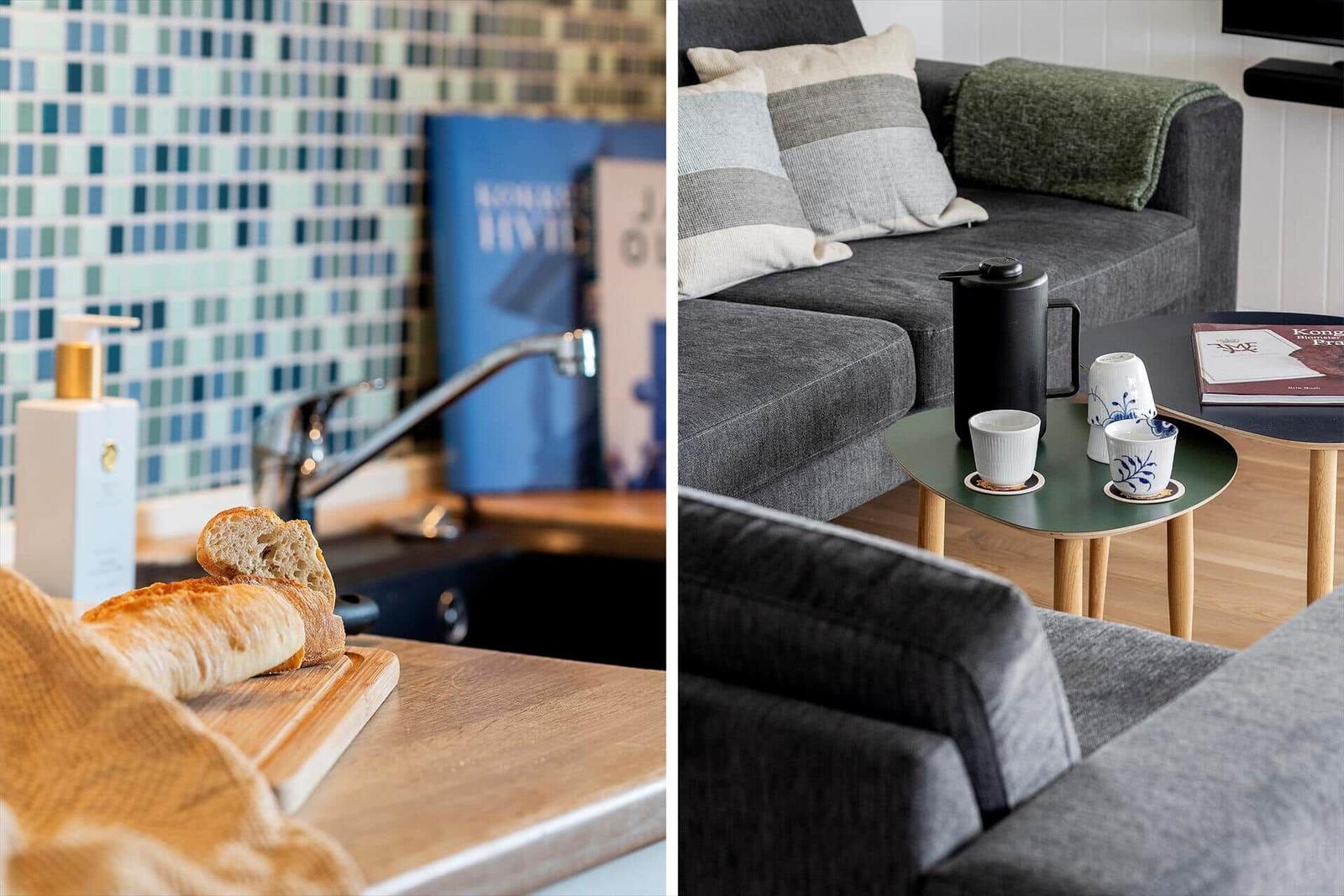 Küche mit Mosaikwand und Brot. Wohnzimmer mit Sofa und Tisch.