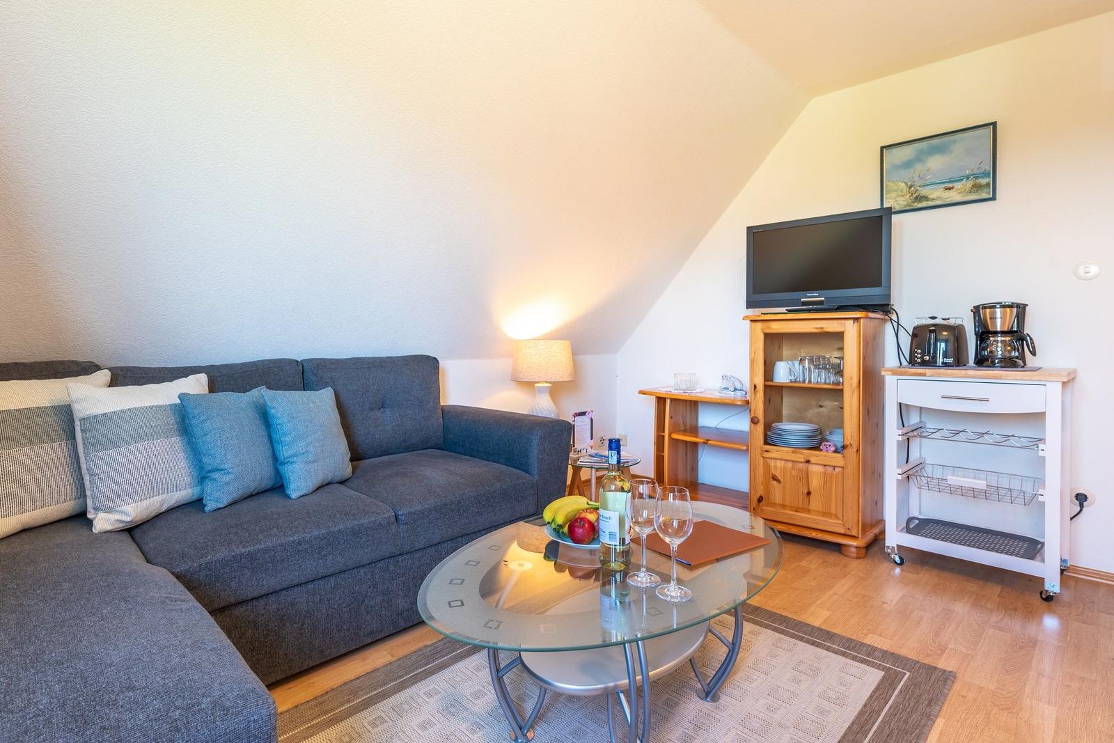 Wohnlandschaft mit Flat-TV