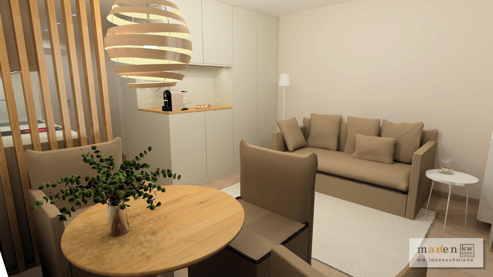 Wohnbereich mit Sofa, Tisch und moderner Beleuchtung.