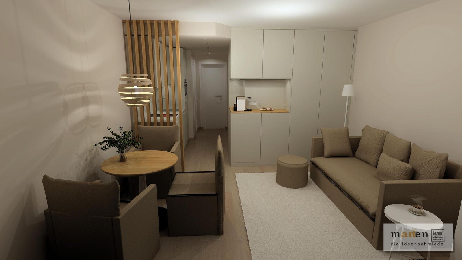 Wohnzimmer mit Sofa, Esstisch und Küchenbereich.