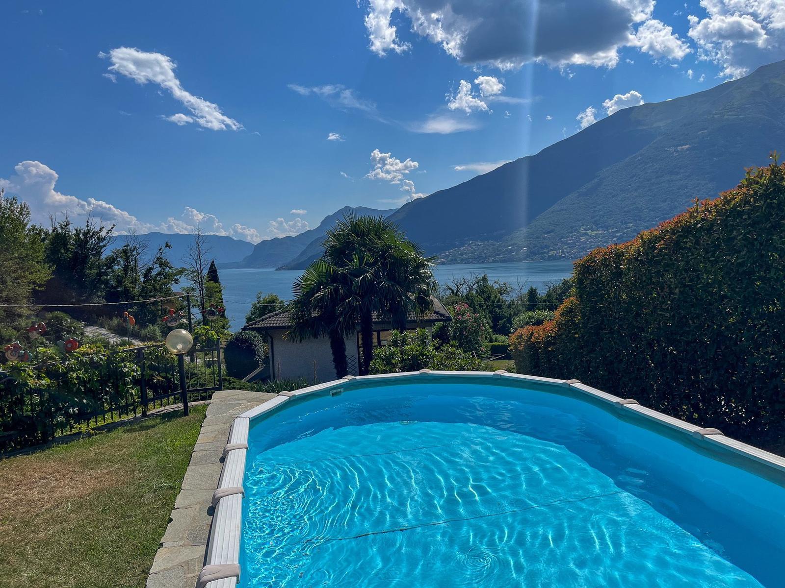 Pool with view of lake and mountains