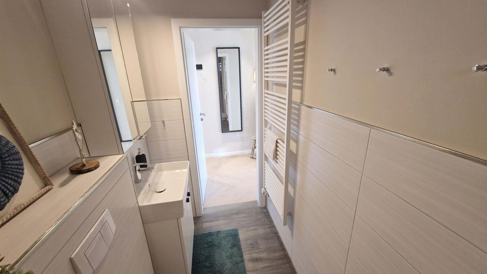 Badezimmer mit Handtuchtrockner...