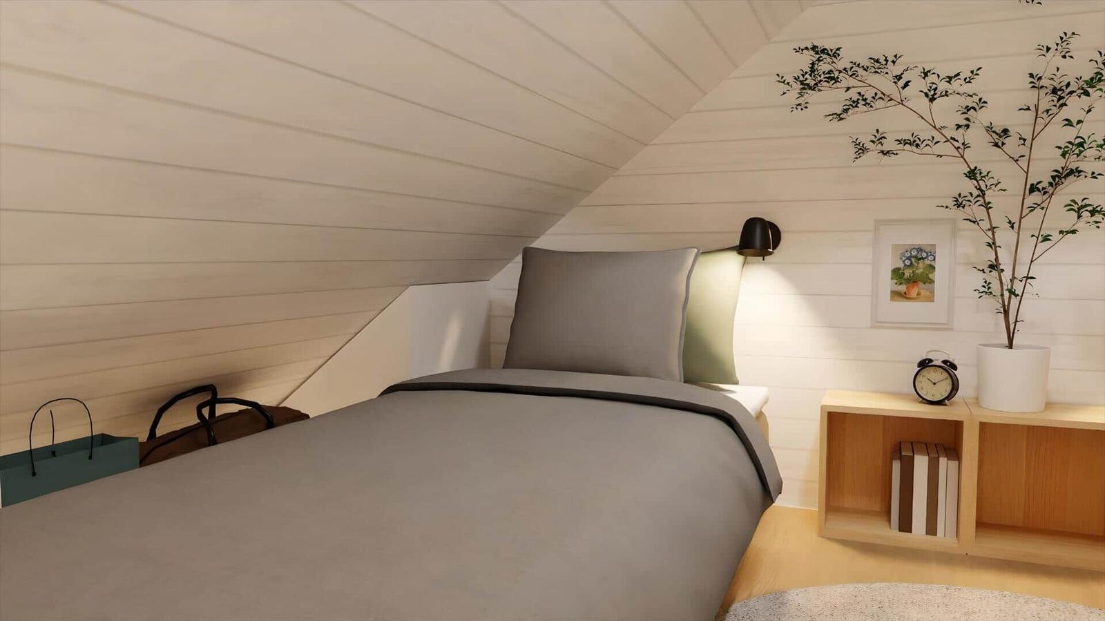 Bedroom with sloped ceiling, bed, nightstand, and plant.