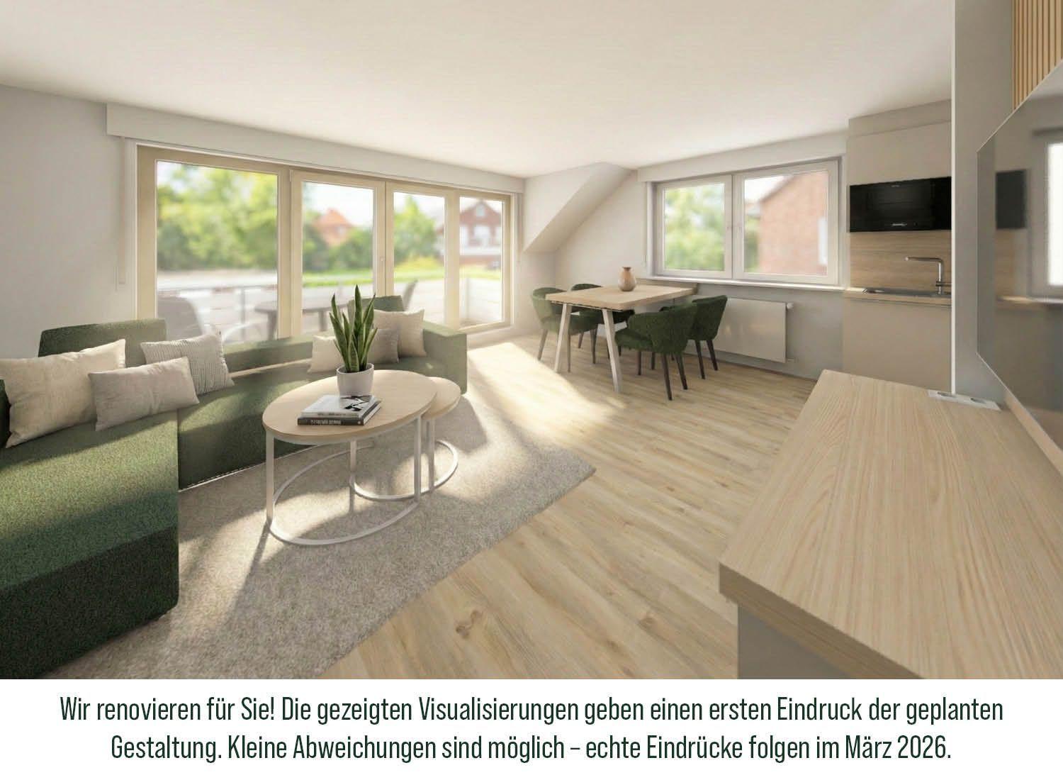 Wohn- und Essbereich mit grünem Sofa, Holzboden und Fenstern. Küche im Hintergrund.