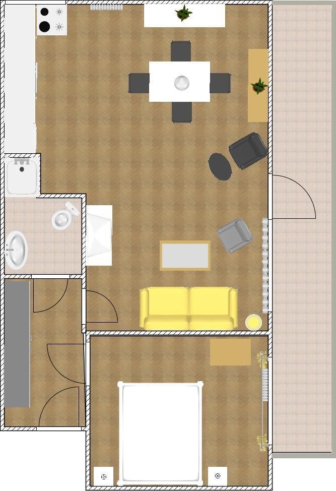 Ein Raum mit Schlafzimmer, Wohnbereich, Essplatz und Bad. Möbel und Einrichtung sind sichtbar.