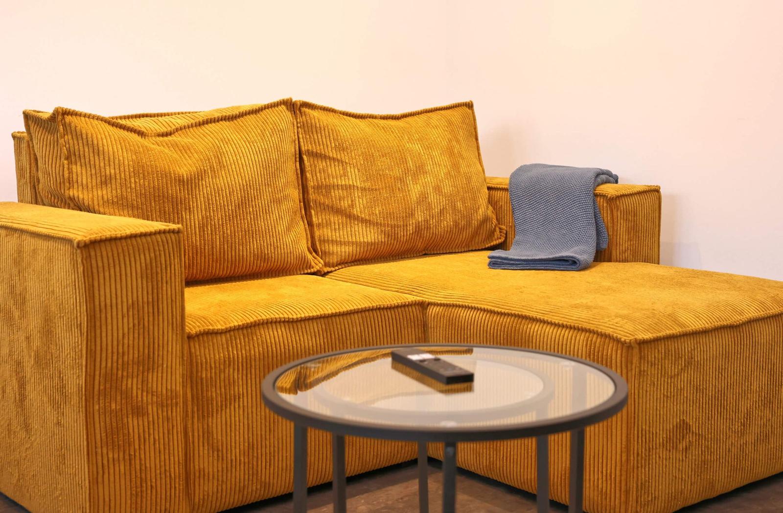 Two-seater sofa for relaxing moments