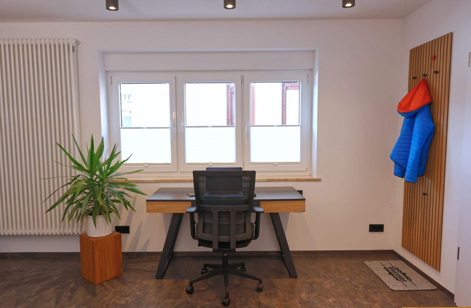 Practical desk with ergonomic office chair