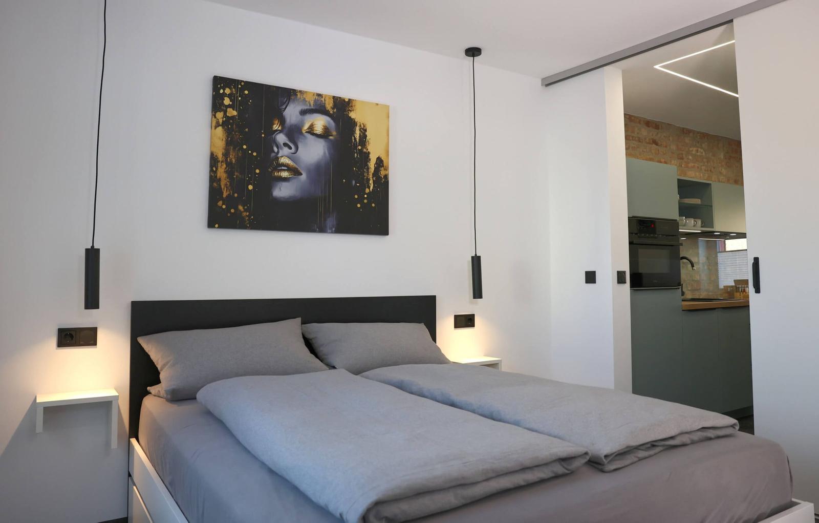 Bedroom with sliding door to the kitchen