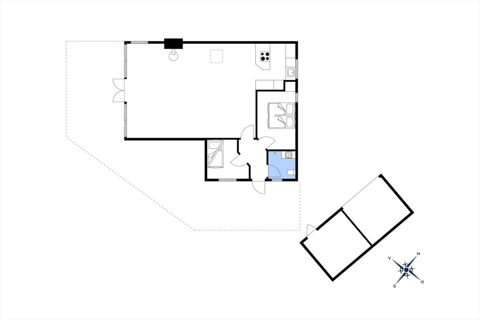 Dieses Apartment hat eine Küche, ein Bad und einen Wohnbereich mit Schlafplatz.