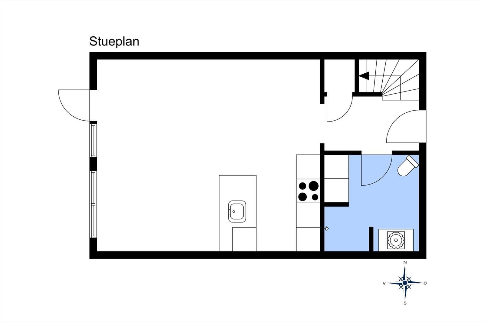 Floor plan shows kitchen, bathroom, and staircase with compass