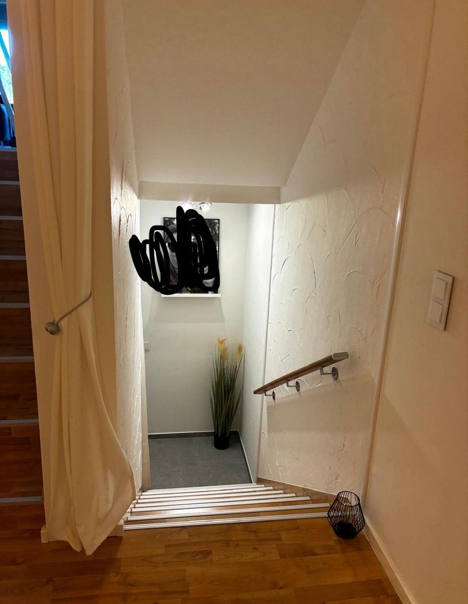 Treppe zum Schlafzimmer und Bad