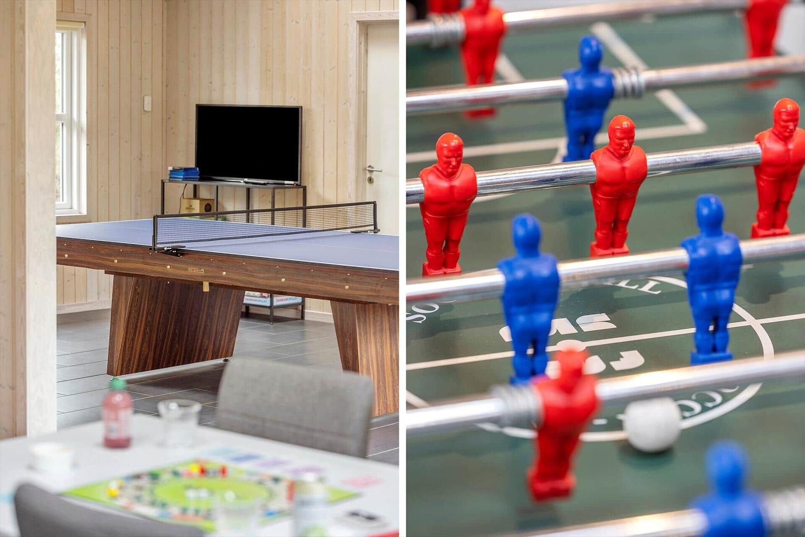 Room with ping pong table and foosball table. TV and toys are visible.