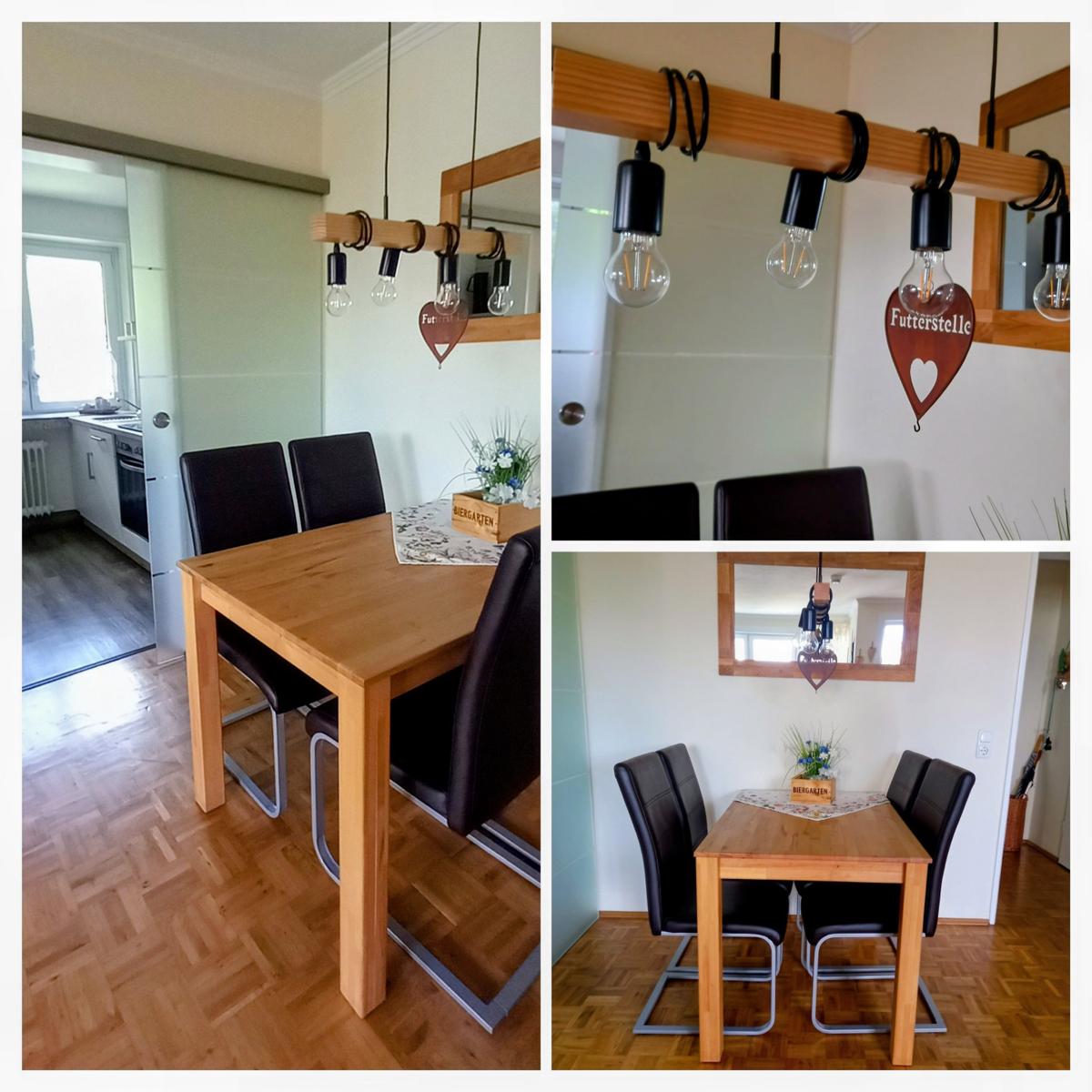 Sie sitzen bequem am Tisch vor der separaten Küche