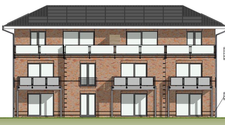 Zweistöckiges Gebäude mit Balkonen und Fenstern. Dach mit Solaranlage.