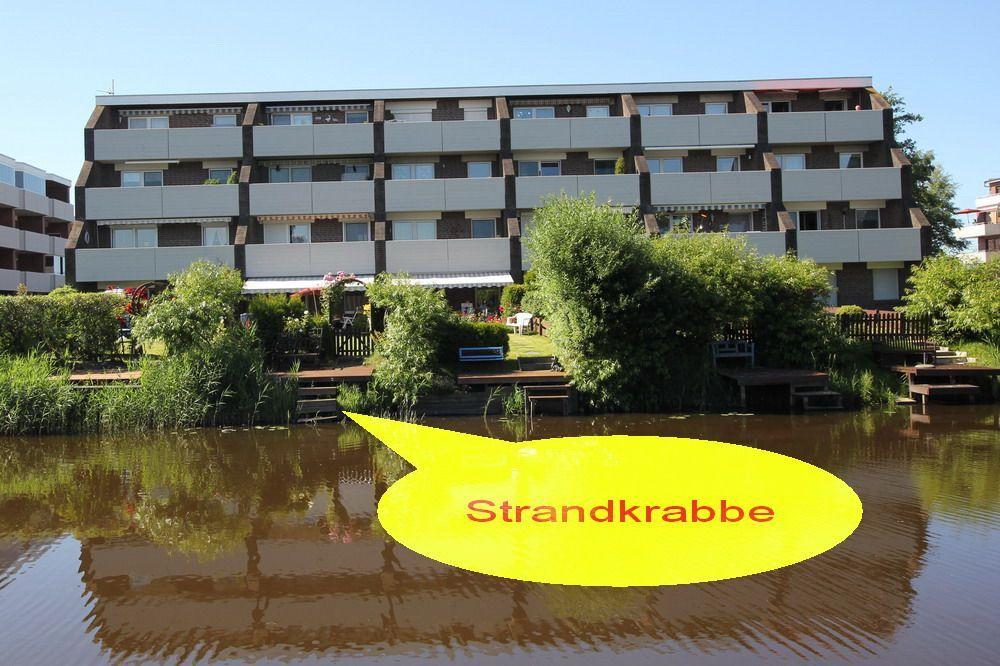 Ferienwohnung am Wasser mit Gartenbereich und Balkonen