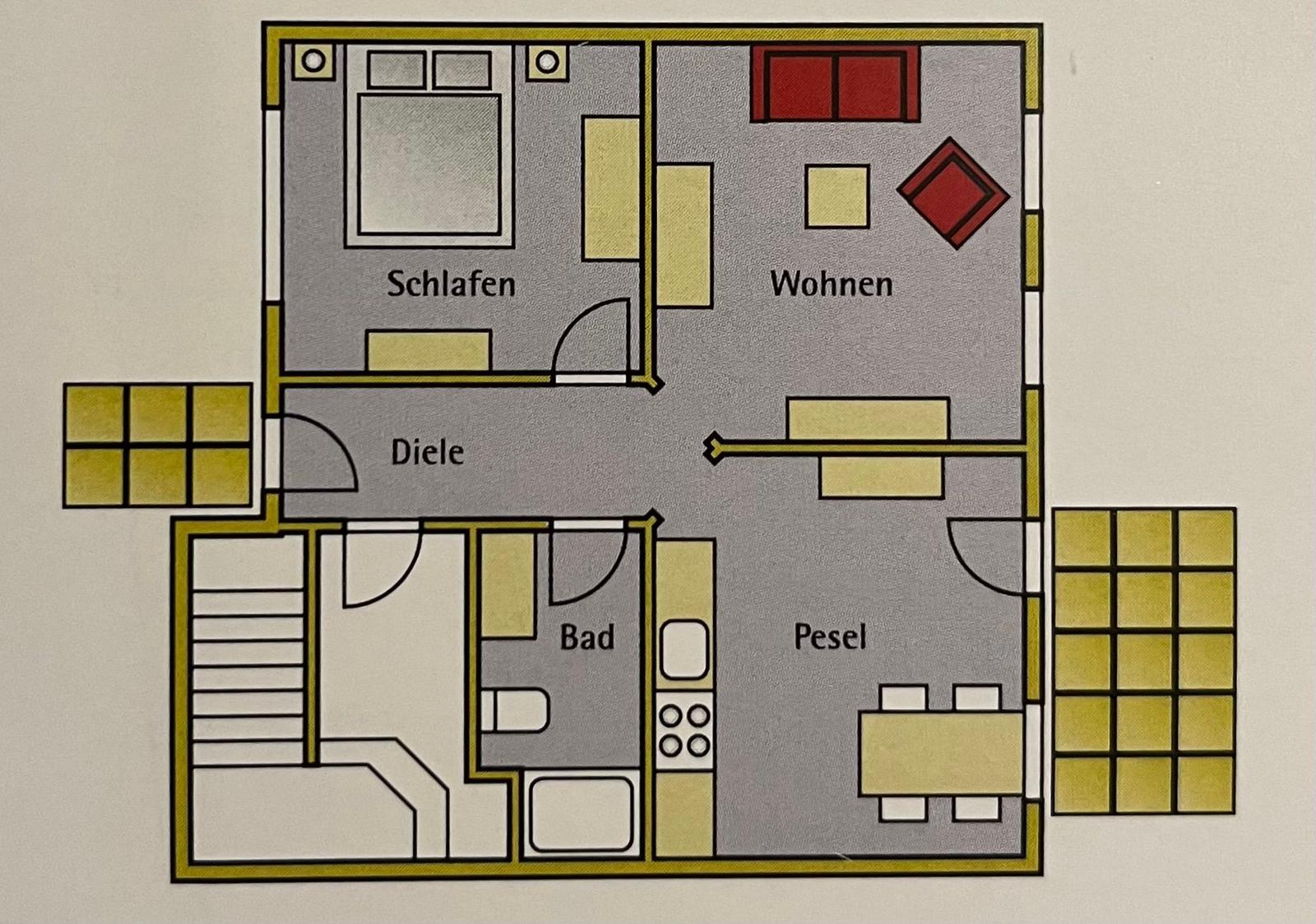 Dies ist eine Grundrisszeichnung einer Wohnung mit Schlaf-, Wohn-, Ess- und Badraum sowie einer Diele.