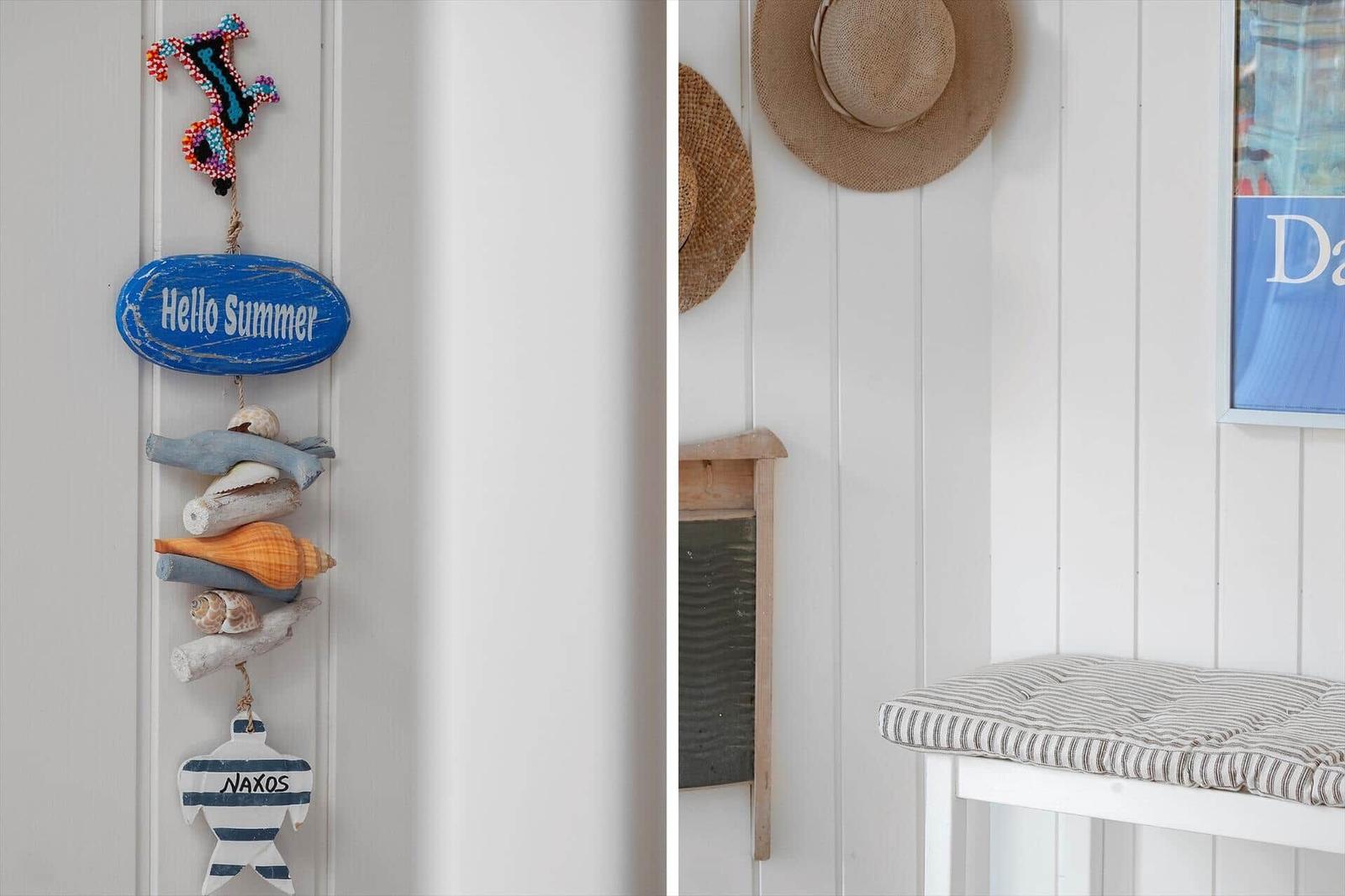 Wall with beach decor and chair with cushion