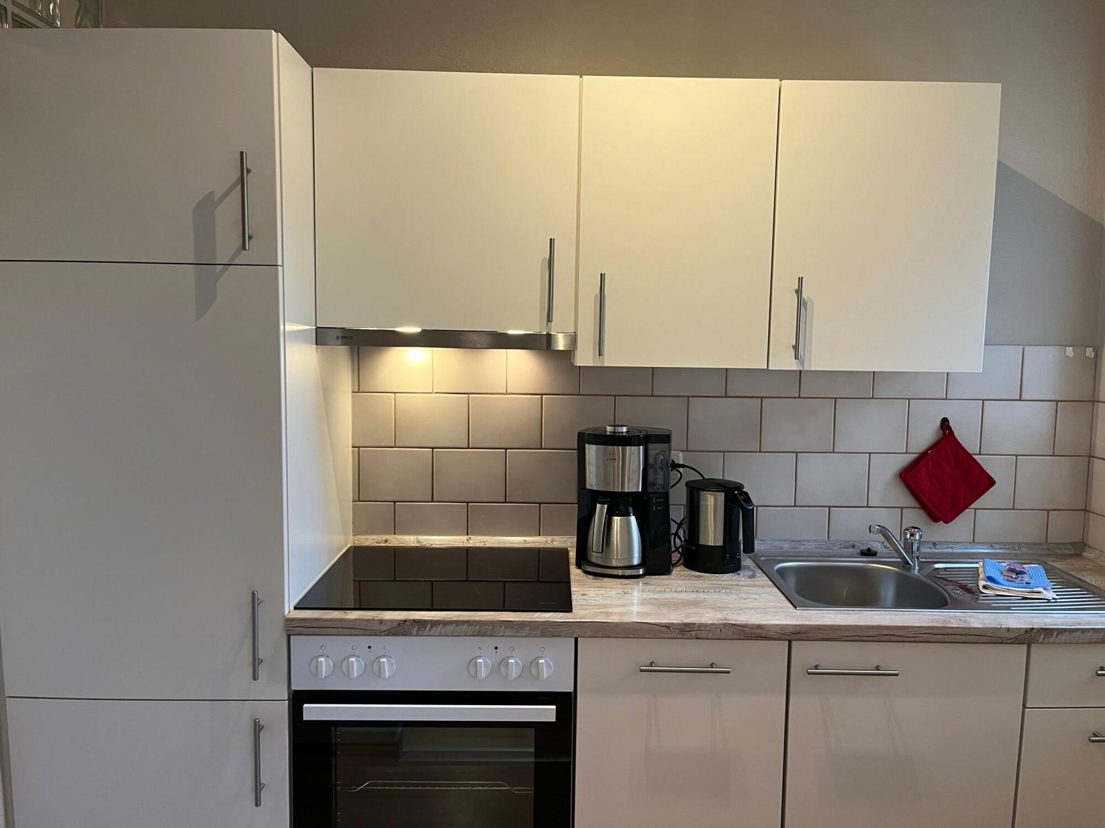 Wohn-/Schlafbereich mit offener Küche