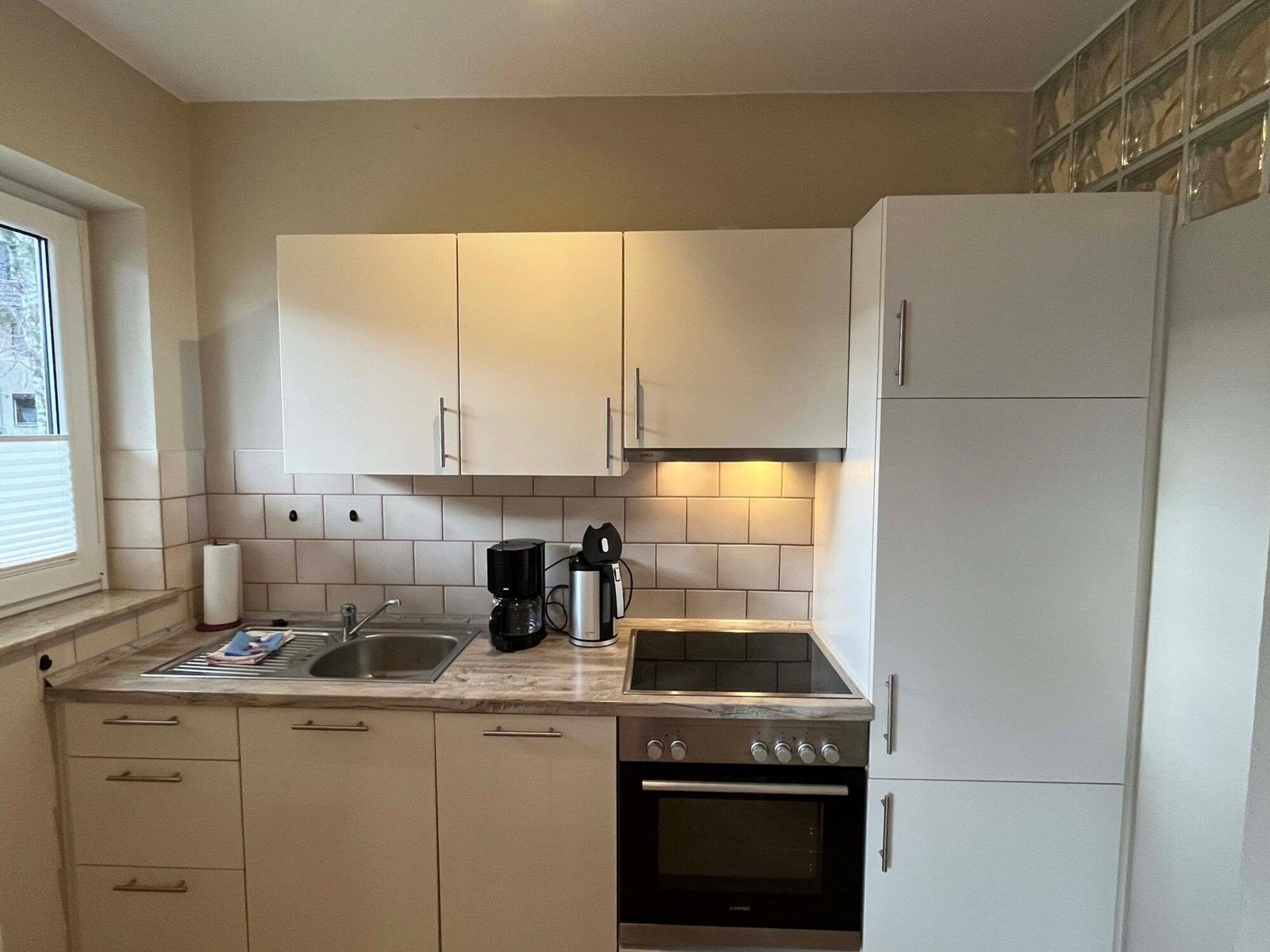 Wohn-/Schlafbereich mit offener Küche