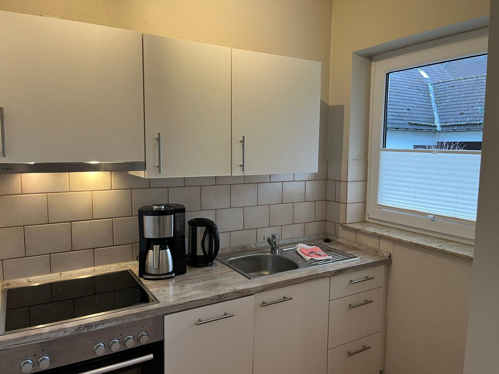 Wohn-/Schlafzimmer mit offener Küche