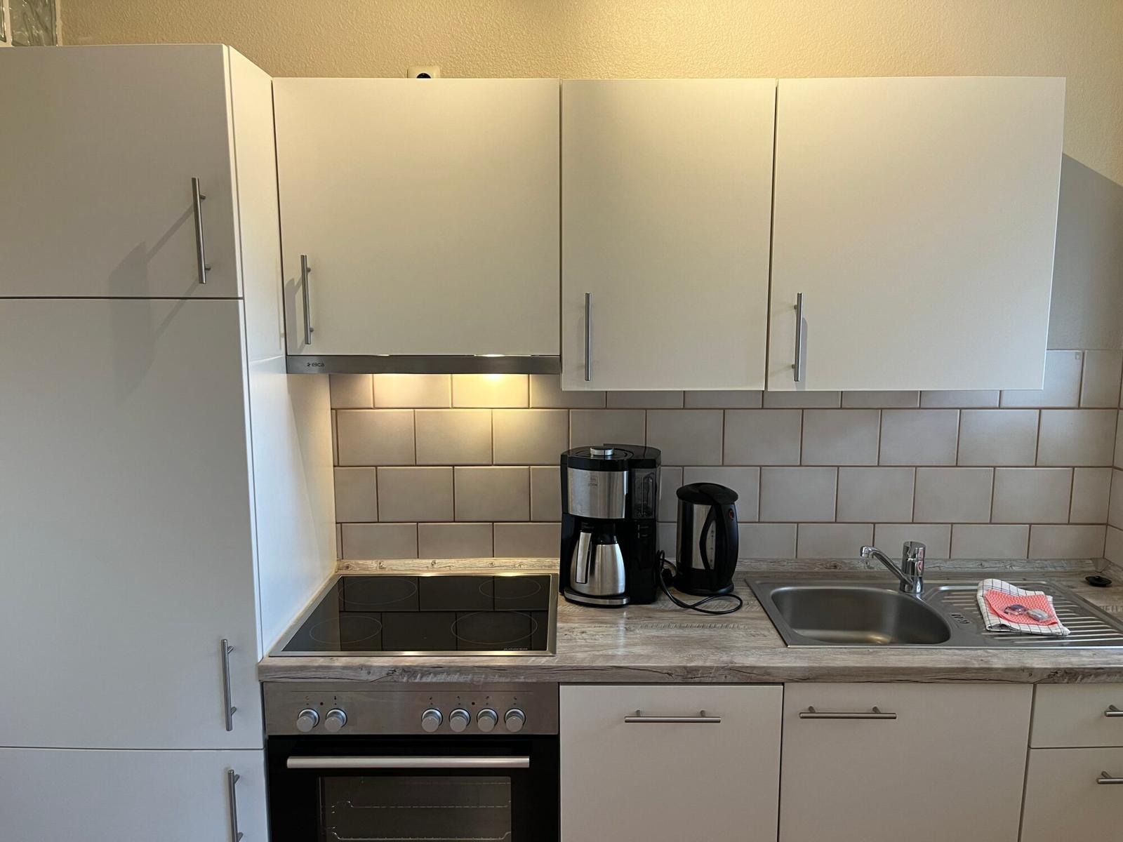 Wohn-/Schlafzimmer mit offener Küche