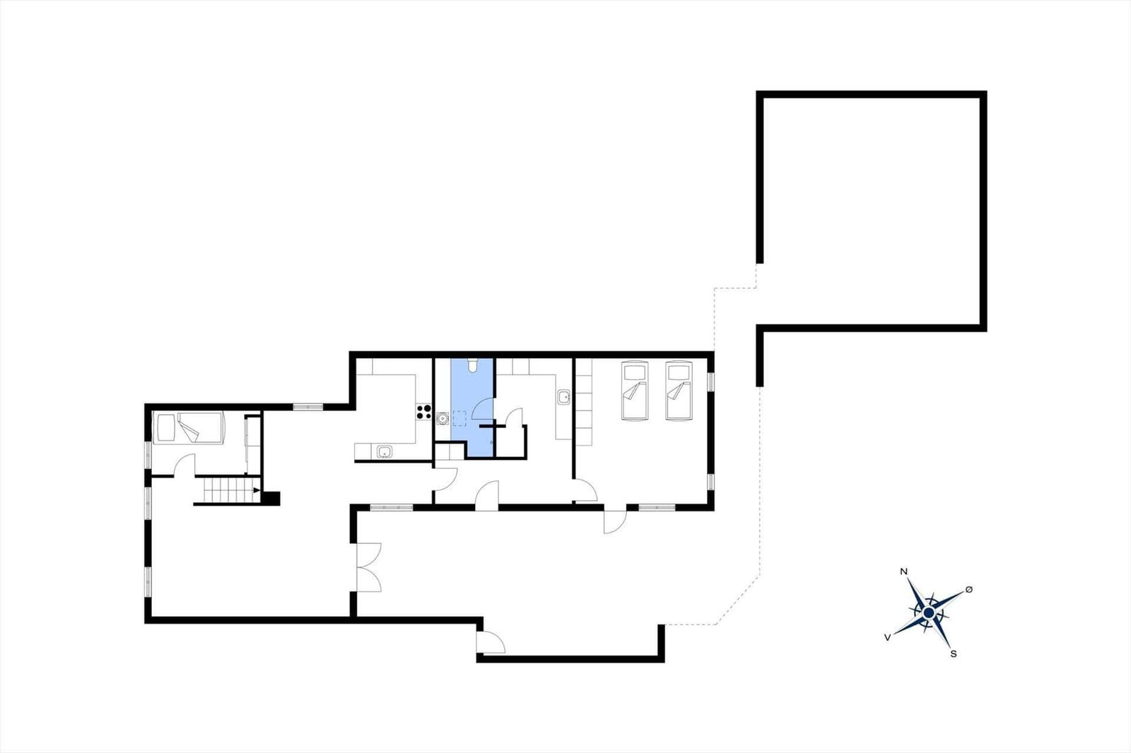 This floor plan shows an apartment with kitchen, bathroom, and bedroom. 