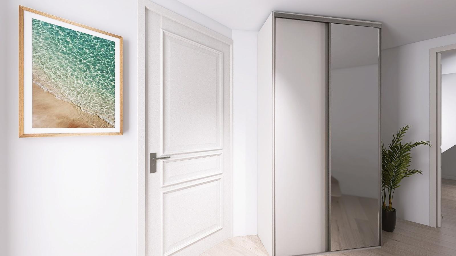 Schlafzimmer mit Schiebetürenschrank, Wandbild und Zimmerpflanze.