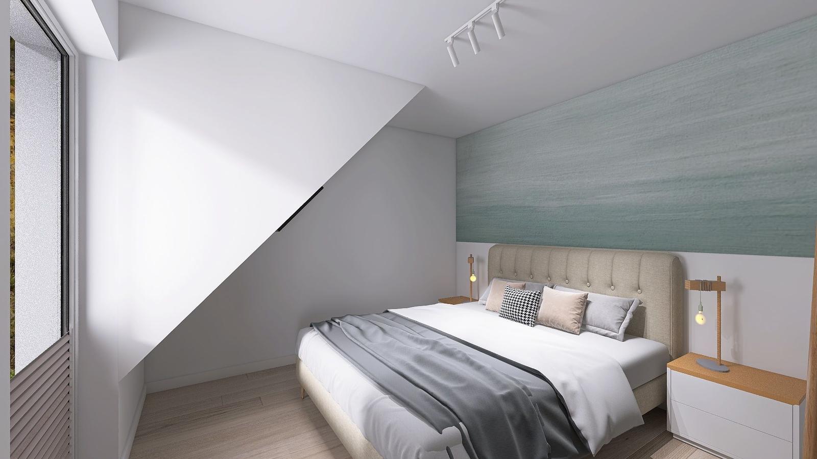 Schlafzimmer mit Dachschrägen, Bett, Nachttisch und Fenster.