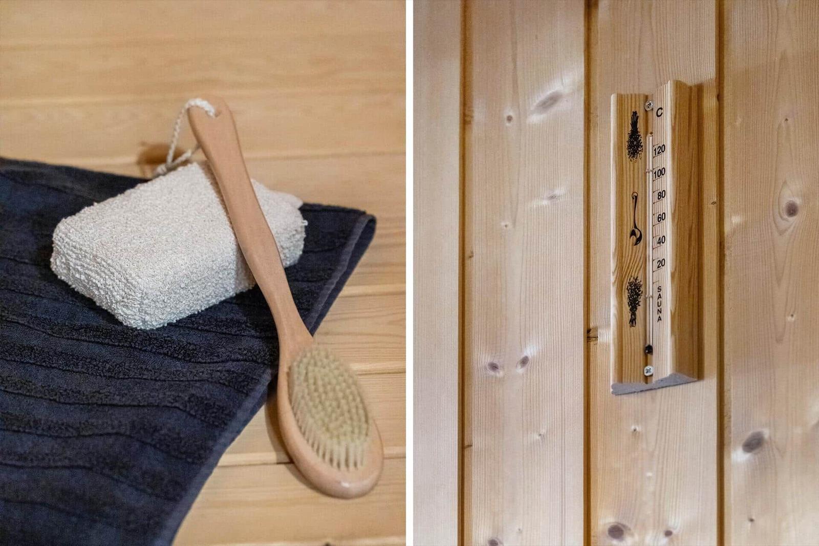 Sauna with wood finish, bath brush, and towel.