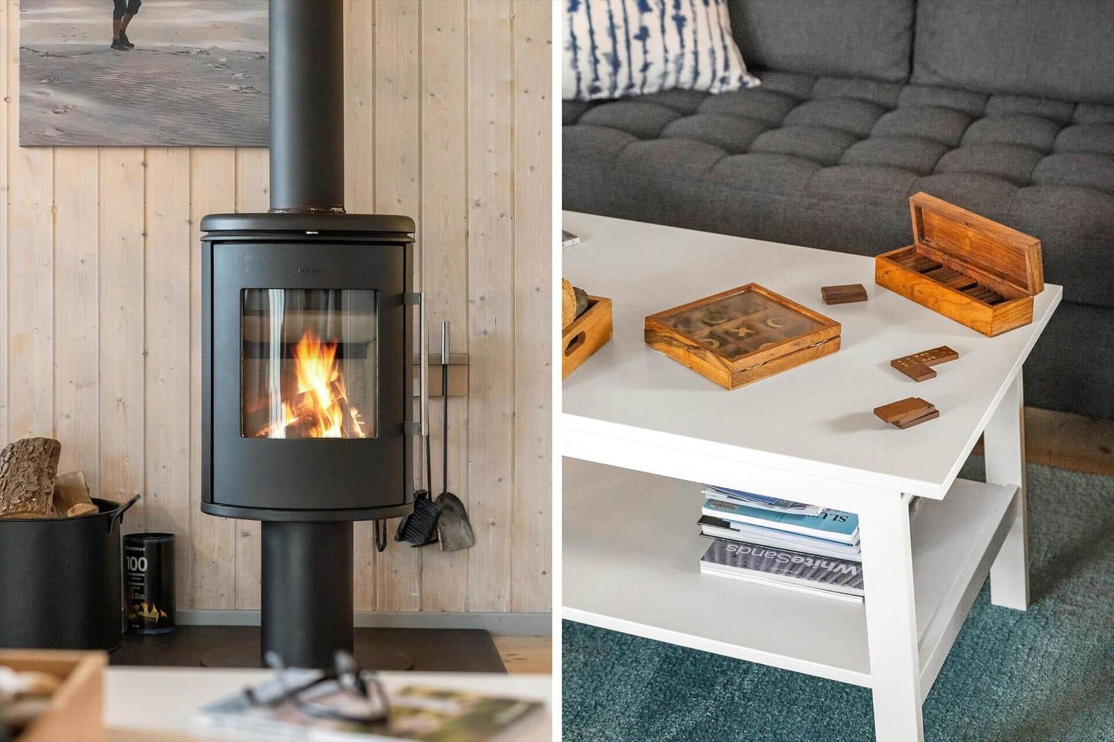 Wood-burning stove and living room with sofa and table.