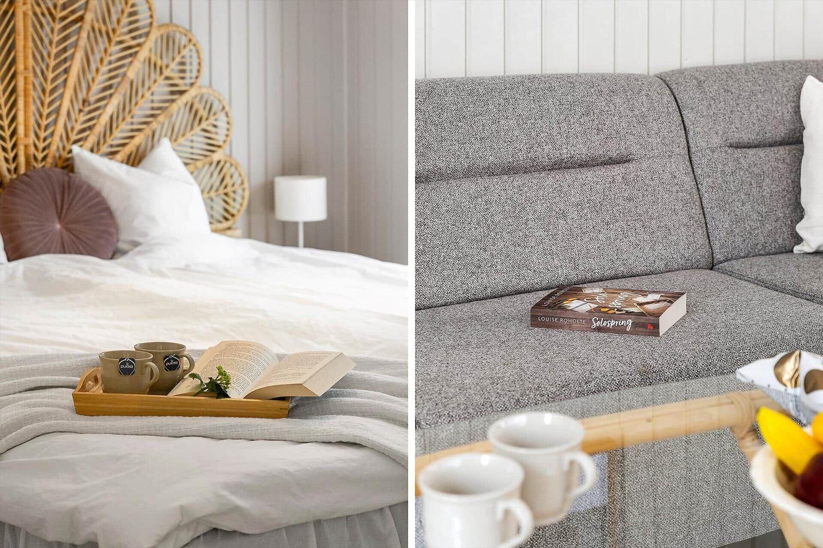 Bedroom with bed, headboard, and book. Living room with sofa, book, and drinks.