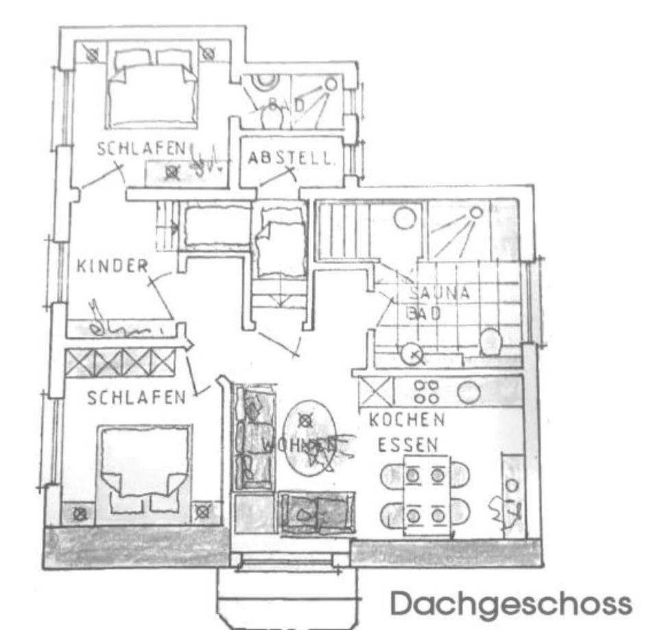Dachgeschoss mit Schlafbereichen, Sauna, Bad und Küche.