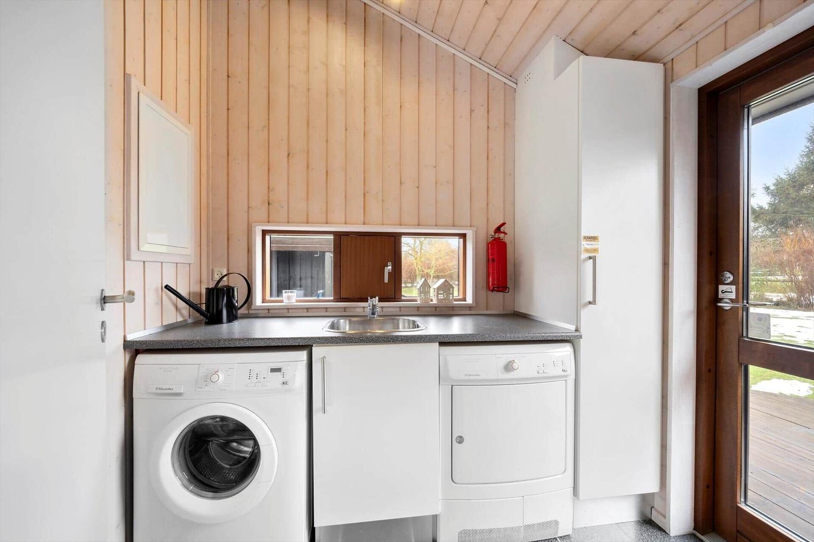 Washing and drying area with sink and window