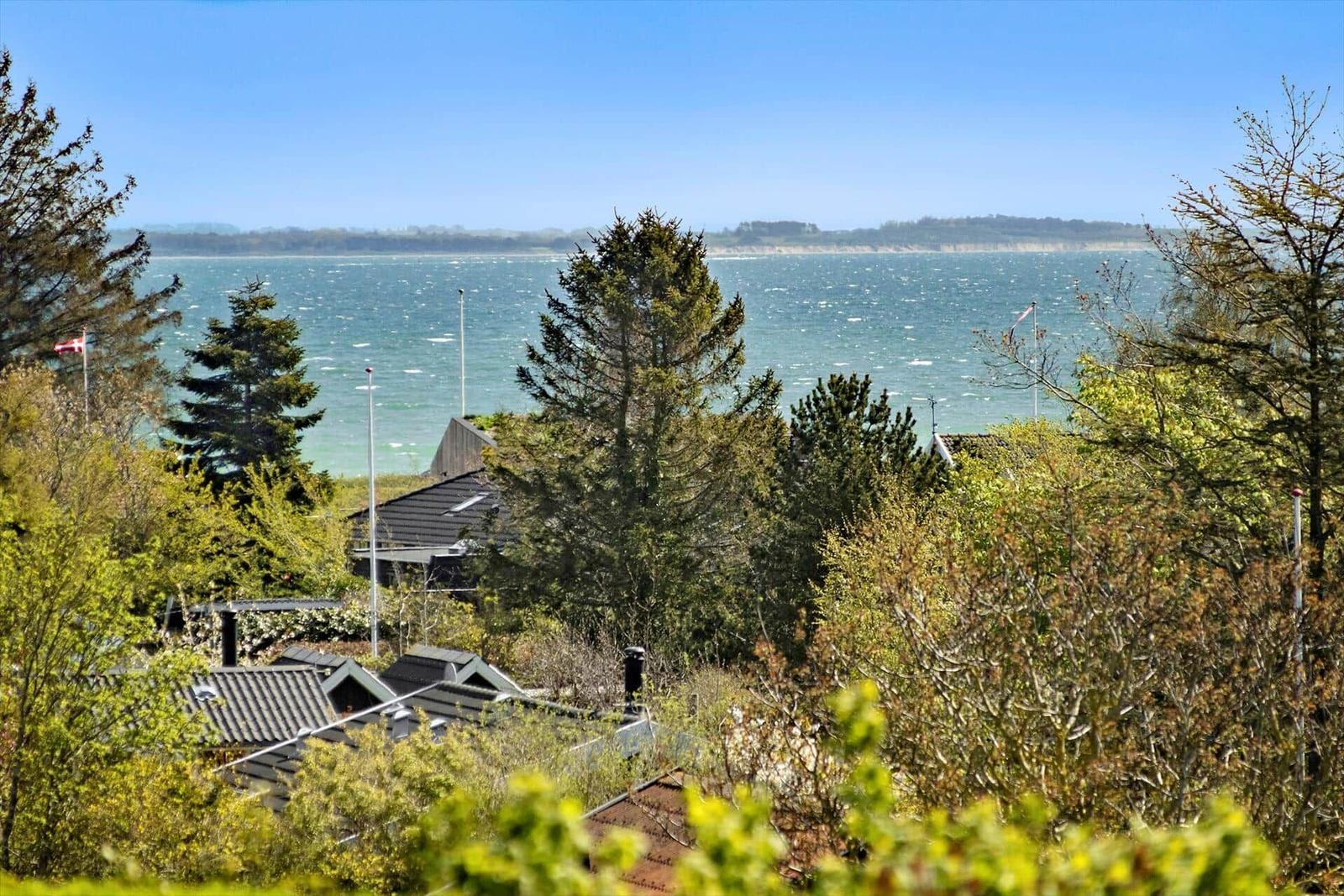 House with view of sea and trees